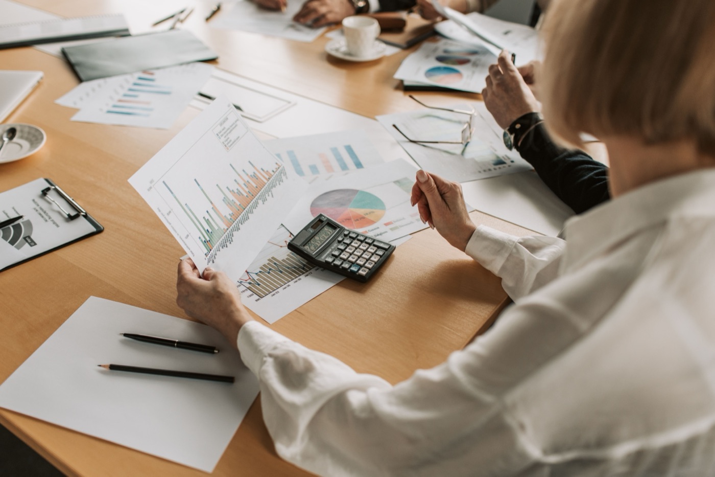 An accountant reviewing reports and figures